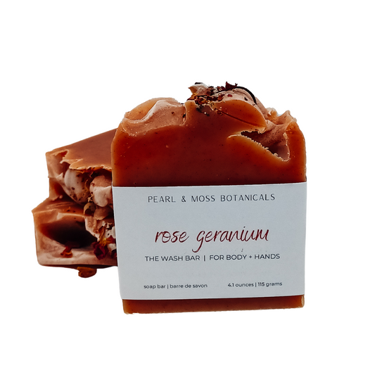 Rose Geranium bar is scented with uplifting pink grapefruit and floral geranium essential oils, includes white kaolin clay, and is naturally coloured with madder root powder. Topped with organic rose petals, this beauty is bright, refreshing and like a floral garden escape.