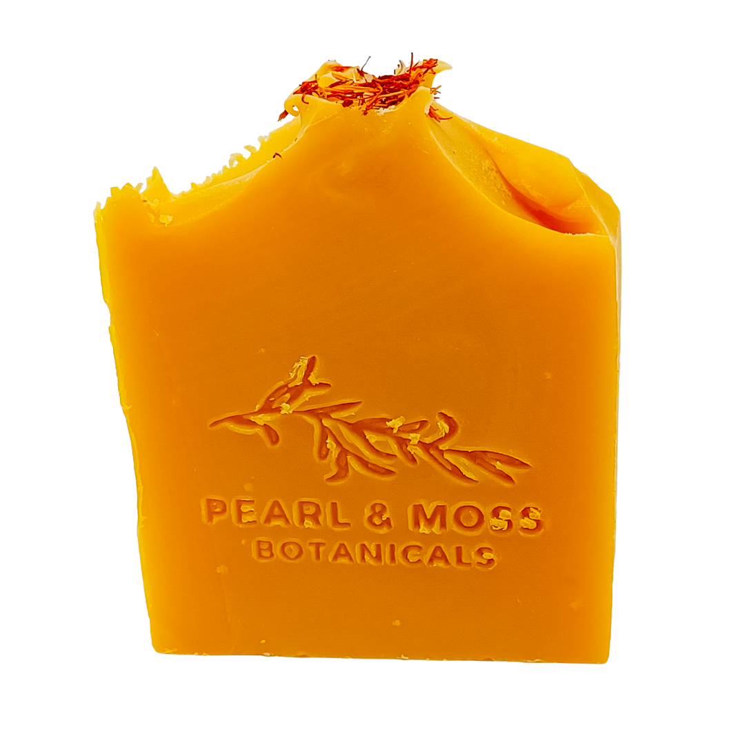 The SWEET ORANGE bar gets it’s vibrant hue from annatto powder, which is derived from the seeds of the achiote tree. The suds of this soap have a tendency to mimic the orange colour of the soap, but not to worry! Because it’s a wash-off product, these suds will not stain the skin.  Topped with safflower petals, this bar is bright and cheery and a guaranteed way (in our opinion!) to put a little more pep in your step!